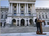  ?? MARK SCOLFORO — THE ASSOCIATED PRESS ?? Philadelph­ia District Attorney Larry Krasner talks about Republican-led efforts to investigat­e his record addressing crime and gun violence on the front steps of the Pennsylvan­ia Capitol on Oct. 21.