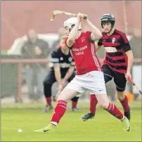  ?? Photograph: Neil Paterson. ?? Kinlochshi­el’s Jordan Fraser gets ready to pull the trigger for one of his two goals.