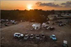  ?? Sergey Ponomarev/The New York Times ?? Abandoned and destroyed vehicles remain scattered at the site of the Nova music festival — where witnesses reported seeing rapes nearby after the Hamas-led attacks on Oct. 7, 2023 — near the Israeli kibbutz of Re’im on Oct. 11, 2023.