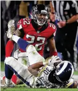  ?? CCOMPTON@AJC.COM CURTIS COMPTON/ ?? Falcons safety Keanu Neal reacts to leveling Rams running back Todd Gurley with a hard hit in the wild-card game last January.