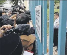  ?? AP PHOTO ?? North Korean Embassy counsellor Kim Yu Song reads a news release to reporters at the gate of the embassy in Kuala Lumpur, Malaysia.