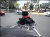  ?? PICTURE: AP ?? Ballet dancers perform at a traffic light in Mexico City, at the weekend. In this sprawling megalopoli­s, notorious for its clogged streets, dealing with traffic recently got a bit brighter. A theatre company is sending tutu-clad dancers out to delight...