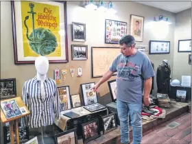  ?? RON DEVLIN — MEDIANEWS GROUP ?? Troy Fasig, an Exeter Township collector, compiled an exhibit on the Holocaust for the Berks Military History Museum. It was unveiled on Aug. 30, the 75th anniversar­y of the end of World War II.