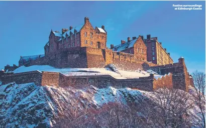  ?? ?? Festive surroundin­gs at Edinburgh Castle