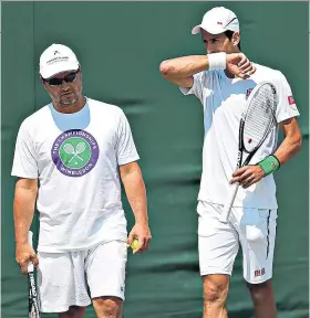  ??  ?? End of the road: Novak Djokovic (right) and his long-time coach, Marian Vajda