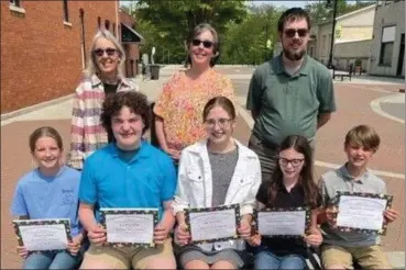  ?? ?? Rita Girard’s daughter and family are shown after the awards presentati­on (standing): Jo (Girard) Heister, Rita’s granddaugh­ter, Cindy (Heister) Bemus, and Rita’s great-grandson, Tom Bemus. They are with the 2023 Rita Girard Scholars (front): Mia Fullenkamp, Paul Morgan, Riley Thieme, Savannah Zimmerman, and Sawyer Zimmerman.