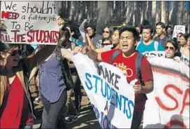  ?? Don Bartletti Los Angeles Times ?? UC REGENTS will weigh raising tuition and student services fees for the next academic year. Above, a rally against a similar motion in 2014 at UC San Diego.