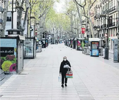  ?? Àlex Garcia / Archivo ?? La Rambla de Barcelona desierta el 11 de febrero del 2021