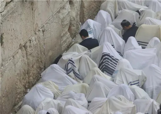  ?? (Marc Israel Sellem/The Jerusalem Post) ?? THE PRIESTLY blessing at the Kotel – how do we combine the Torah with the Jewish state?