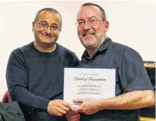  ?? CAROLE MORRIS-UNDERHILL ?? West Hants Warden Abraham Zebian presented Coun. Robbie Zwicker with a scroll of recognitio­n Jan. 14, honouring his 11 years of political service to the area.