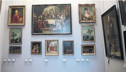  ?? CHRISTOPHE ENA THE ASSOCIATED PRESS FILE PHOTO ?? Paintings looted by Nazis during the Second World War on display at the Louvre museum in Paris.