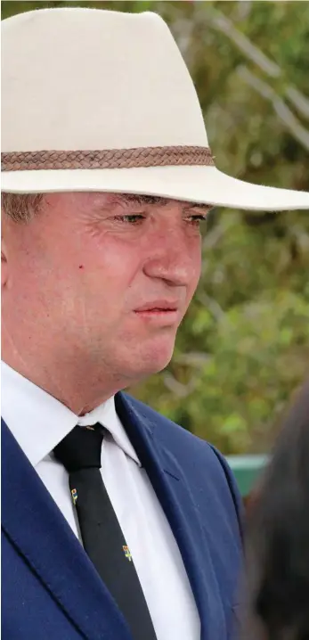  ?? PHOTO: MARLON DALTON/AAP ?? GOING, GOING... Barnaby Joyce tells media representa­tives in Armidale, NSW about his pain and his desire for a ‘circuit breaker’ for other parties in the matter.
