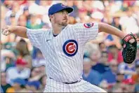  ?? Nuccio DiNuzzo / Getty Images ?? Mark Leiter Jr. of the Cubs replaced injured starter Alec Mills with one out in the first inning, and allowed just one run, three hits and one walk with five strikeouts over 51⁄3 innings against Boston.