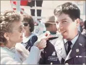  ??  ?? V I L L A N U E VA with his mother at his 1983 graduation from Officer Candidate School with the Army National Guard. Later he became a sheriff’s deputy.