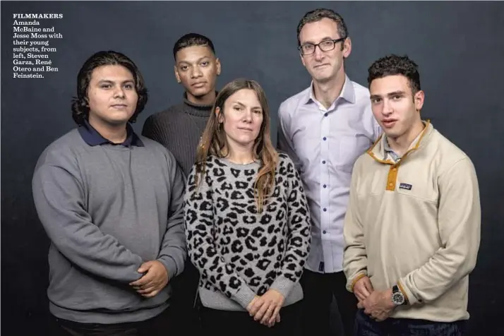  ?? Jay L. Clendenin Los Angeles Times ?? FILMMAKERS
Amanda McBaine and Jesse Moss with their young subjects, from left, Steven Garza, René Otero and Ben Feinstein.