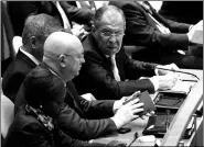  ?? EVAN VUCCI / ASSOCIATED PRESS ?? Russian Foreign Minister Sergey Lavrov listens as US President Donald Trump addresses the United Nations General Assembly on Tuesday.