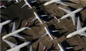  ?? Photograph: Elijah Nouvelage/Reuters ?? Passenger planes grounded in Birmingham, Alabama, in March.