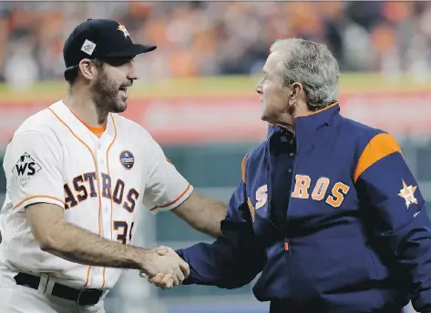  ?? DAVID J. PHILLIP/ASSOCIATED PRESS ?? Houston Astros starter Justin Verlander shakes hands with former U.S. president George W. Bush before Sunday’s epic Game 5 of the World Series. Verlander will be on the mound for Game 6 Tuesday in Los Angeles with a chance to give the Astros their...