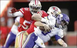  ?? BEN MARGOT / ASSOCIATED PRESS ?? Vikings quarterbac­k Kirk Cousins is sacked by 49ers defensive end Nick Bosa during the second half Saturday, one of six San Francisco sacks.