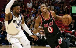  ?? JOE SKIPPER / AP ?? Forward Josh Richardson, who signed a contract extension last offseason, has stepped up his game on the offensive and defensive ends of the court.