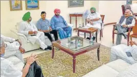  ?? PTI ?? Punjab Congress Committee president Navjot Singh Sidhu along with others during a meeting with chief minister Capt Amarinder Singh in Chandigarh on Tuesday.