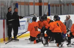  ?? NEWS PHOTO JAMES TUBB ?? Medicine Hat Cubs head coach and general manager Randy Wong addresses the first group of skaters in the opening ice time of their spring camp this weekend at the Hockey Hounds Arena.