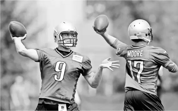  ?? CARLOS OSORIO, AP ?? Quarterbac­k Matthew Stafford, left, says Super Bowl 50 is the Lions’ team goal but adds, “You’ve got to make incrementa­l steps.”