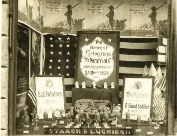  ??  ?? Spud guns A shop in Iowa urges “potatriots” to “Join the ranks and spud the kaiser”. With huge amounts of wheat being shipped to Europe, America’s wartime government actively promoted potato consumptio­n