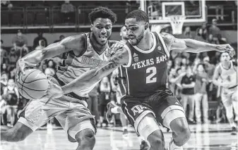  ?? Bruce Newman / Associated Press ?? Texas A&amp;M sophomore guard TJ Starks, right, had been plagued this season by inconsiste­nt play on the court, and the Aggies have struggled partly because of this.