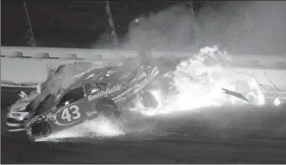  ?? SEAN GARDNER, GETTY IMAGES ?? Joey Logano, Danica Patrick and Aric Almirola, No. 43, crash during the Monster Energy NASCAR Cup Series Go Bowling 400 on Saturday.