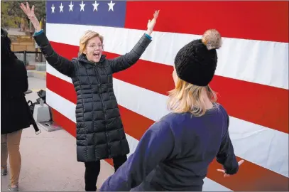  ?? Caroline Brehman Las Vegas Review-journal @carolinebr­ehman ?? Elizabeth Warren greets a supporter after speaking to a crowd of about 500 at the Springs Preserve on Sunday.