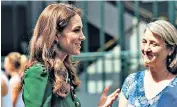  ??  ?? Fruity chat:
The Duchess of Cambridge (left) meets Marion Regan, whose farm is Wimbledon’s official strawberry supplier