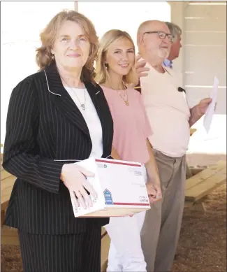  ?? Brodie Johnson • Times-Herald ?? From left, Past District Rotary Governor Darlene Andrews, Molly Pipkin and Forrest City Rotary Club member John Jordan welcome people to the new Rotary Park on South Izard Street. Pipkin and Jordan introduced the park to the Rotary Club in 2021 for a project.