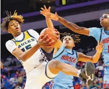  ?? ELIAS VALVERDE II/ THE DALLAS MORNING NEWS ?? Oak Cliff Faith Family Academy’s Jadyn Toppin, left, grabs a rebound during the Texas Class 4A state championsh­ip game against Wichita Falls Hirschi on March 12, 2022 in San Antonio, Texas.