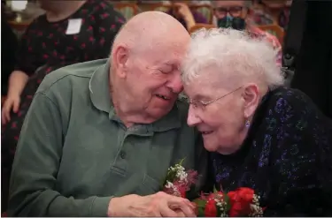  ?? COURTESY OF CHESTNUT KNOLL ?? Chestnut Knoll residents Don and Grace Campbell embrace during a vow renewal ceremony held at the senior community in Boyertown on Valentine’s Day. The couple has been married for 67years.