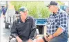  ??  ?? Beef farmers Gary Rolston, from Okaihau, left, and Paul Morrison, from Kaihu, wait for the action.