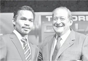  ??  ?? Manny Pacquiao with Bob Arum.