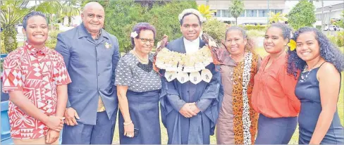  ?? Picture: ATU RASEA ?? Apisalome Colavanua Kava (middle) with family members after he was admitted to the Bar at the High Court in Suva yesterday.