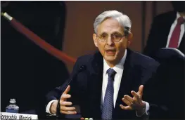  ?? J. SCOTT APPLEWHITE — THE ASSOCIATED PRESS ?? Judge Merrick Garland is expected to take the reins of the Justice Department today after the Senate voted Wednesday to confirm him as attorney general.