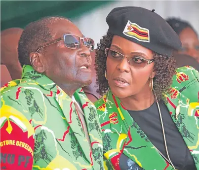  ??  ?? HOUSE ARREST: Robert Mugabe and his controvers­ial wife Grace have been confined to their home by the military