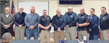  ?? Gordon County Sheriff’s Office ?? Gordon County Sheriff Mitch Ralston recognizes two retiring employees, and five other employees for outstandin­g performanc­e during 2022.