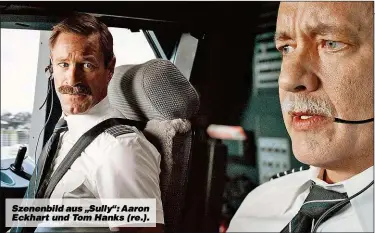  ??  ?? Szenenbild aus „Sully“: Aaron Eckhart und Tom Hanks (re.).