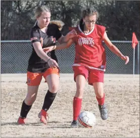  ?? Scott Herpst ?? Lakeview’s Mari Jimenez (right) tries to shield LaFayette’s Harley Perkins away from the ball during last Monday’s match in LaFayette. The Lady Ramblers would pick up a 3-2 victory in a back-and-forth contest.