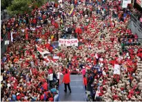  ?? (Reuters) ?? VENEZUELAN PRESIDENT Nicolas Maduro (bottom center) greets supporters on Saturday during a rally in Caracas.