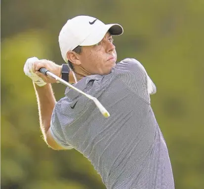  ?? JULIO CORTEZ/AP ?? Rory McIlroy shot an 8-under 64 during the first round of the PGA Tour’s BMW Championsh­ip at Caves Valley Golf Club in Owings Mills to earn a share of the lead.