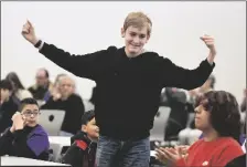  ?? File PHOTO by randy HOEFT/YUMA SUN ?? CRANE CENTENNIAL MIDDLE SCHOOL’S CHARLES BURGE celebrates earning the top seed in the Countdown Round during MATHCOUNTS 2023 Chapter Competitio­n inside the Shoening Conference Center on the Arizona Western College main campus on Feb. 17. Burge would win the Countdown Round.