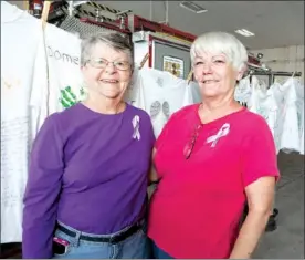  ?? NICK HILLEMANN/RIVER VALLEY & OZARK EDITION ?? Louise Furst, left, of Conway and Charlotte Garrett of Little Rock, formerly of Faulkner County, were honored at a domestic-violence rally Oct. 3 in Conway. Both women have worked tirelessly to help prevent domestic violence, said 20th Judicial District Judge H.G. Foster, who organized the event.