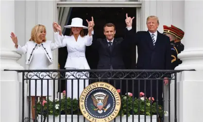  ??  ?? ‘Perhaps the Macrons understand that to exist in Trump-world they must acquiesce to this trophy wife pageant.’ Photograph: Nicholas Kamm/AFP/Getty Images