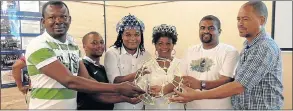  ??  ?? ON THE BALL: This team of Somerset East and Bedford maths teachers, from left, Ernest Boakye, Ayanda Nyatela, Gideon Williams, Nozekelo Nzuta, Neil Bennett and TB Kula were the first to complete their soccer ball sculpture