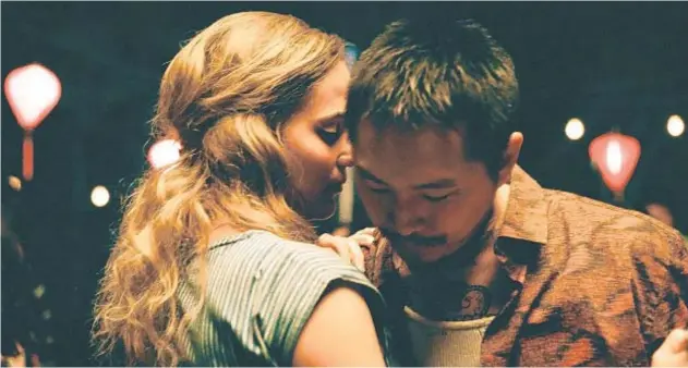  ??  ?? Alicia Vikander stars with Justin Chon — who also wrote and directed — in “Blue Bayou,” which tells story of a Korean adoptee who faces deportatio­n in rural Louisiana.